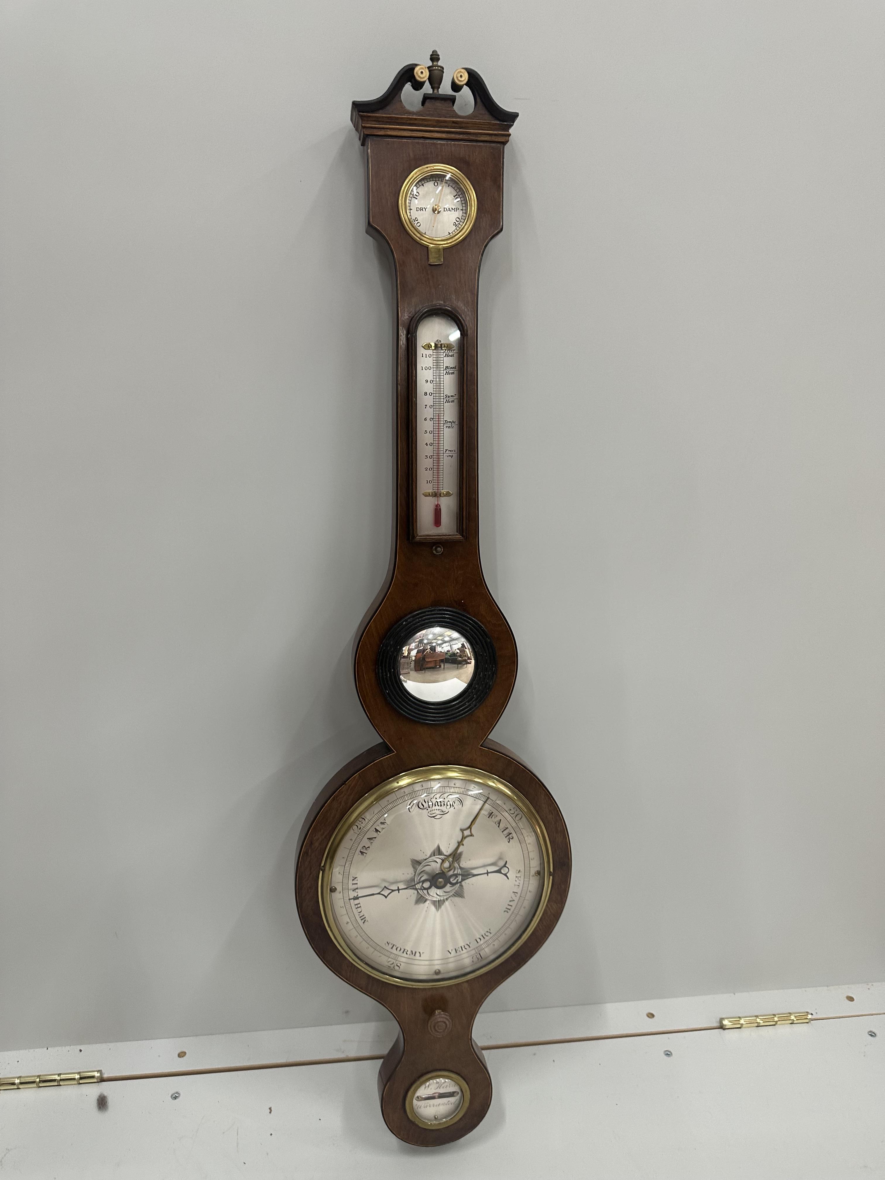 An early 19th century mahogany wheel barometer, height 98cm